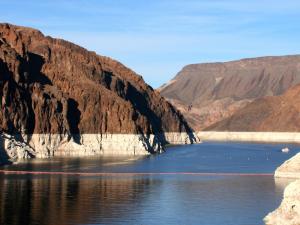 Low water at Lake Mead exposes a wide "bathtub ring" that marks the lake's former level.