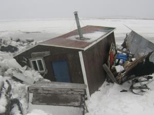 Ice damage to a camp near Golovin, Alaska